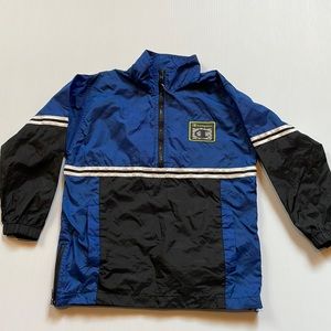 Champion blue and black quarter zip pull over.  Side zippers.  Boys size small